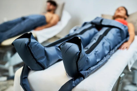 People using leg compression massager for muscle recovery and improved circulation
